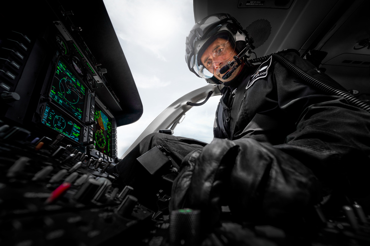 Pilot Matt Wilcock in cockpit of Wiltshire Air Ambulance's helicopter