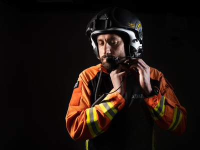 Wiltshire Air Ambulance critical care paramedic Adam Khan securing his flight helmet.