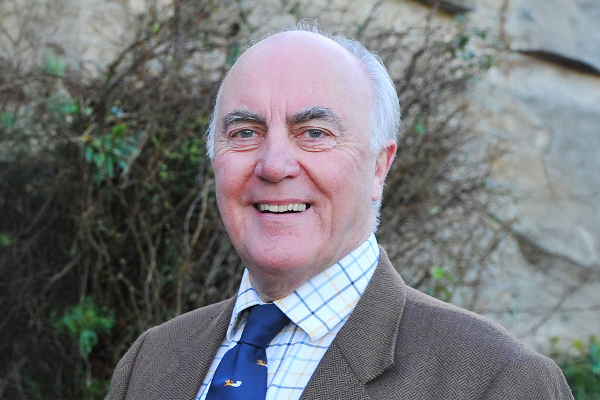 A headshot of Richard Youens stood outside